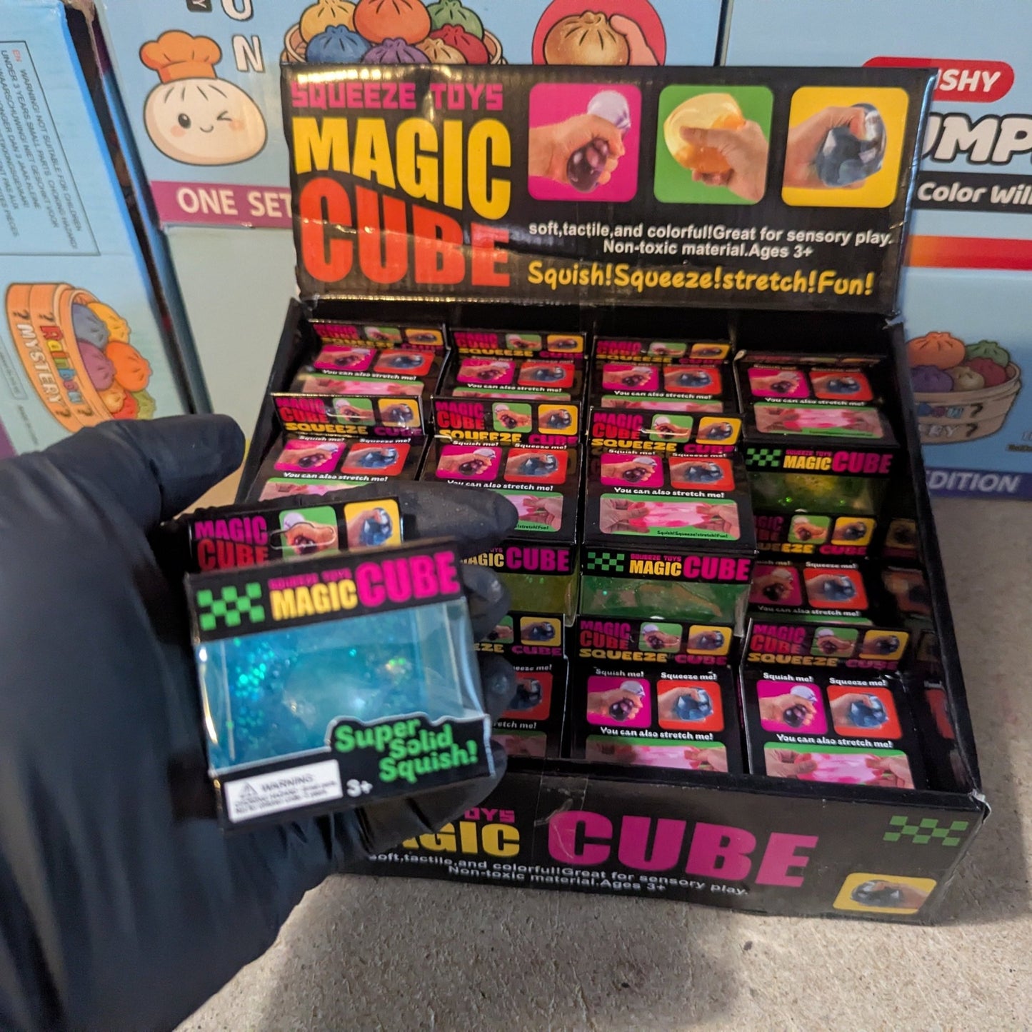 Blue Translucent Glitter Mini Magic Cube by Squeeze Toys (Slow - Rising Squish) - DelsBricks Toys & CollectiblesDelsBricks Toys & CollectiblesRalphie's Funhouse