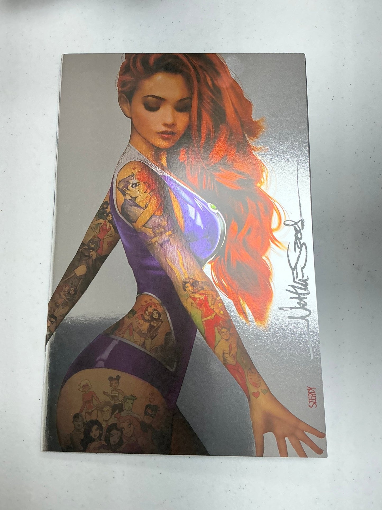 [Signed by Nathan Szerdy] [Foil] TITANS 1 NATHAN SZERDY TATTOO VIRGIN VAR [IN STOCK] - DelsBricks Toys & CollectiblesCOMIC BOOKDelsBricks Toys & CollectiblesUnknown Comic Books
